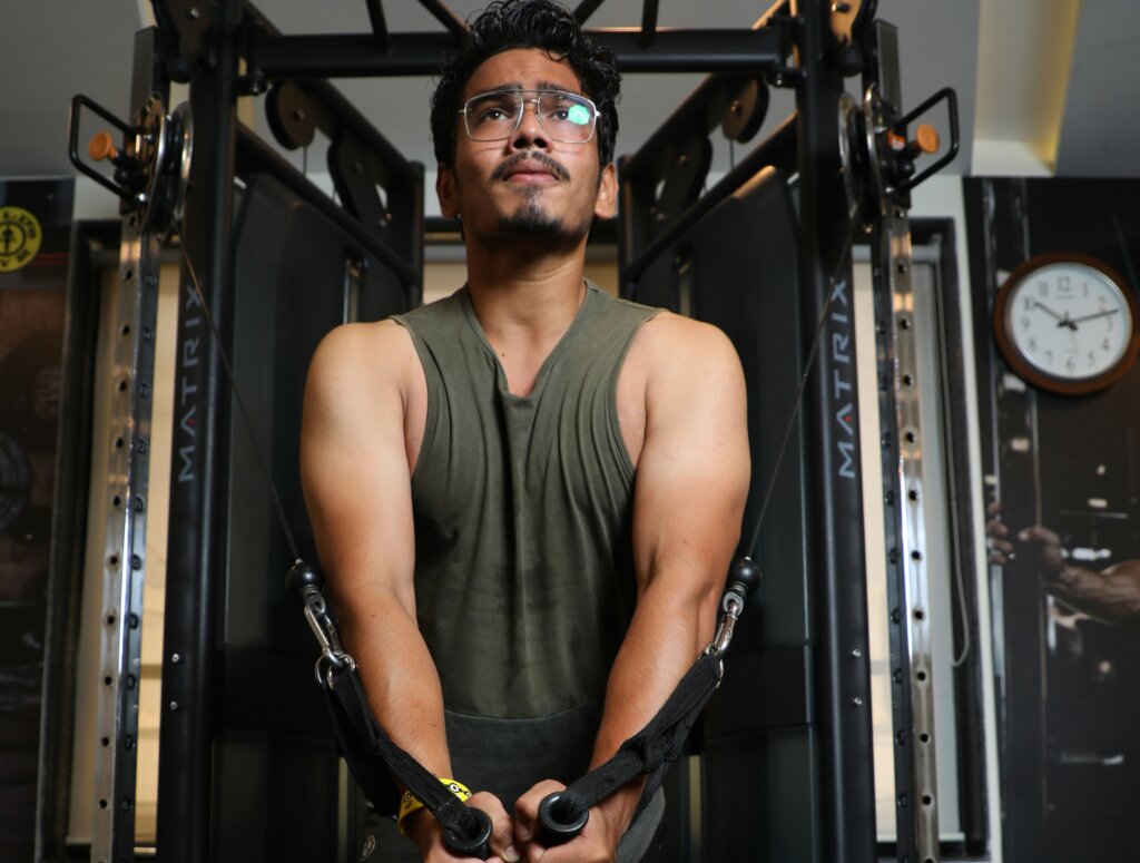 Man using cable machine