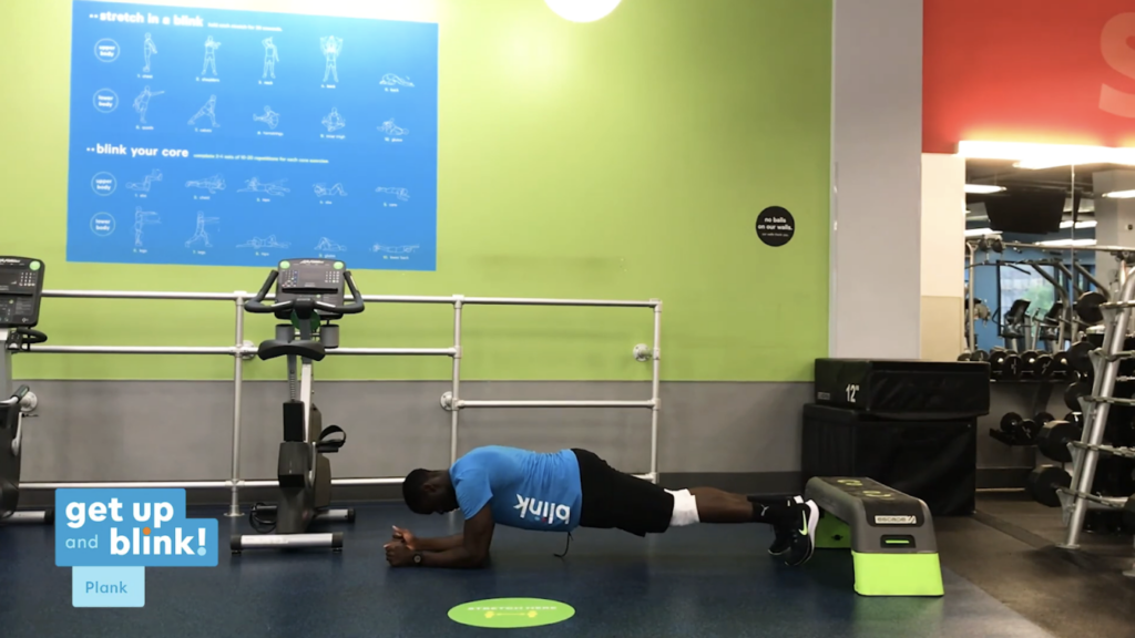 Blink trainer doing plank